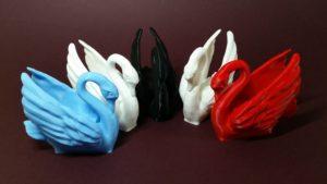 Odile The Swan in White, Black, Blue and Red