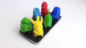Six 3D Printed Pokemons on a Mobile Phone