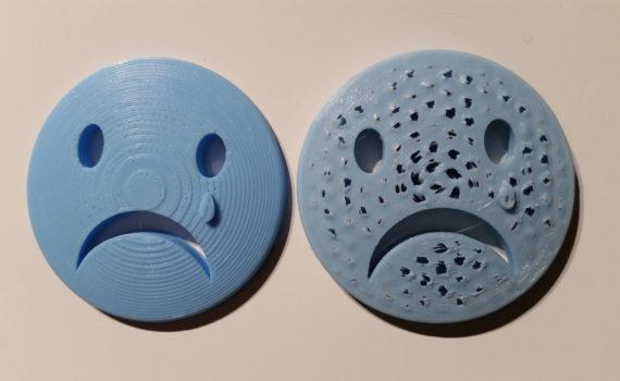 3D Printed Sad Face in Light Blue PLA