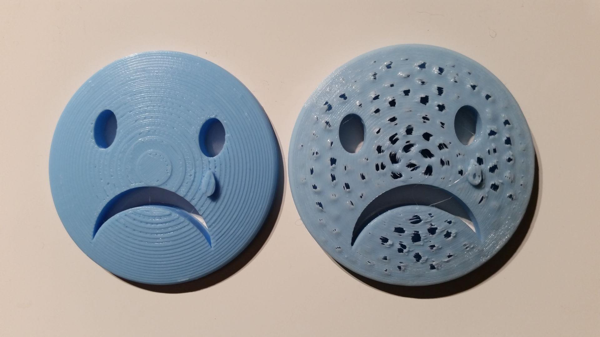 3D Printed Sad Face in Light Blue PLA