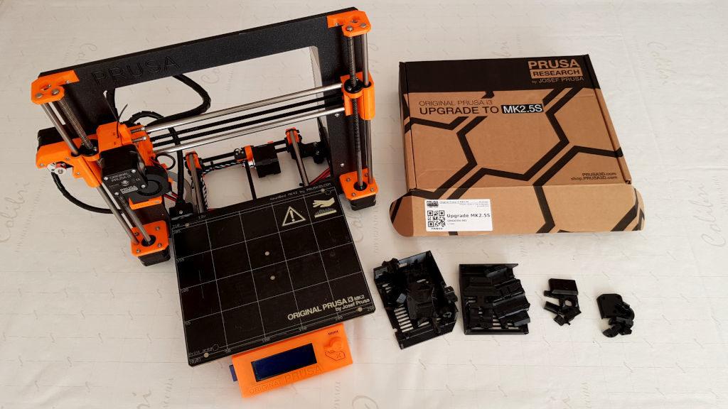 Prusa i3 MK2 and a box with upgrade parts