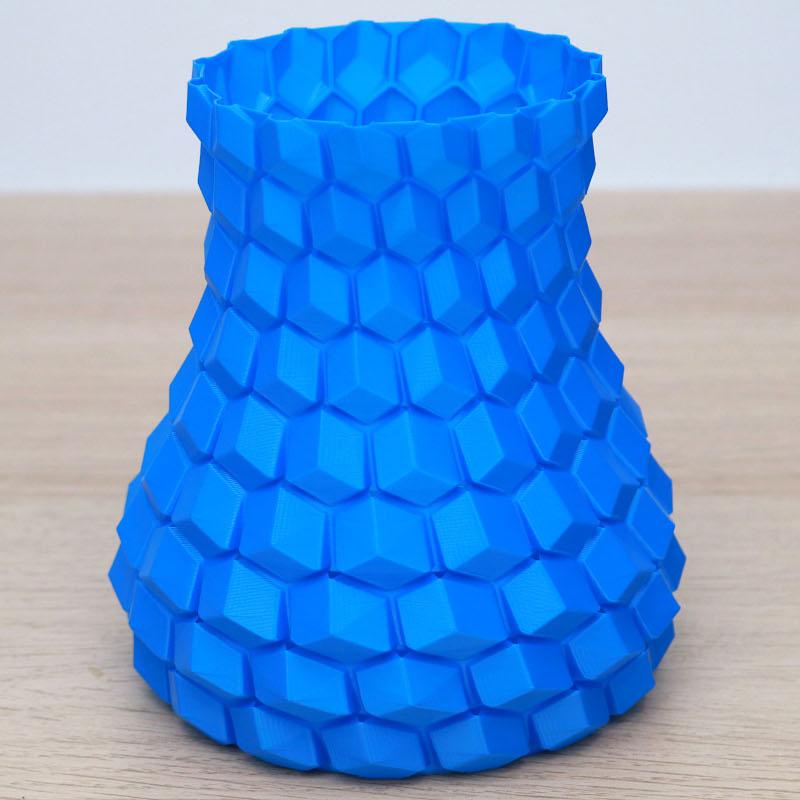 3D Printed Curved Honeycomb Vase in Blue PLA