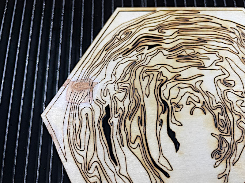 Tree branch knot prevented laser cutting