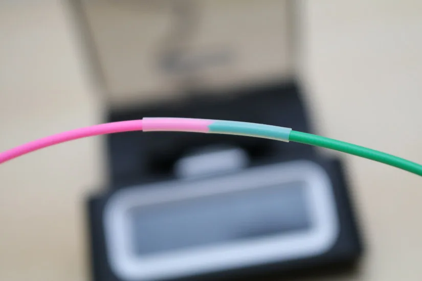 Two pieces of filament prepared for splicing