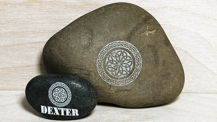 Two Engraved Natural Pebbles
