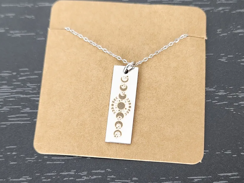 Moon Phases on Silver Pendant