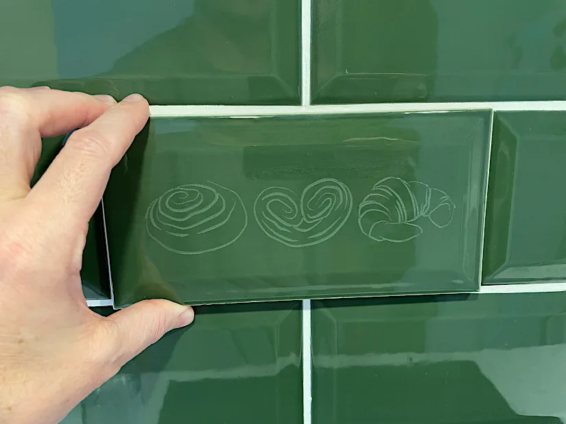 Green Ceramic Tile with Custom Engraving and Kitchen Wall