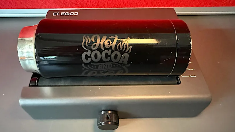 Laser Engraved Travel Mug on a Rotary Attachment