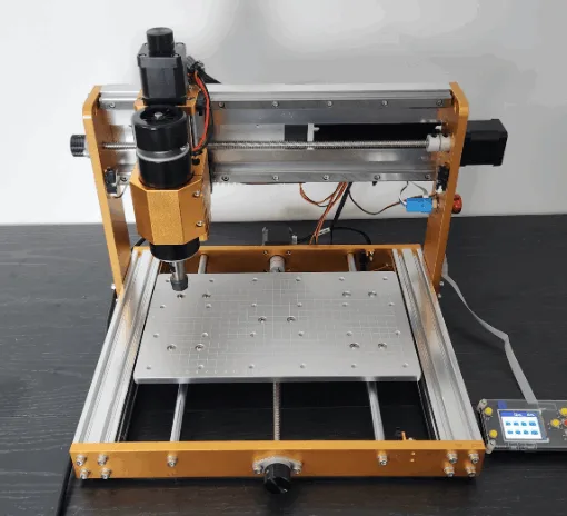 Front view of the Lunyee 3018 Pro Ultra av资源网 machine with aluminum frame, 500W spindle, and offline controller, positioned on a dark wooden surface.