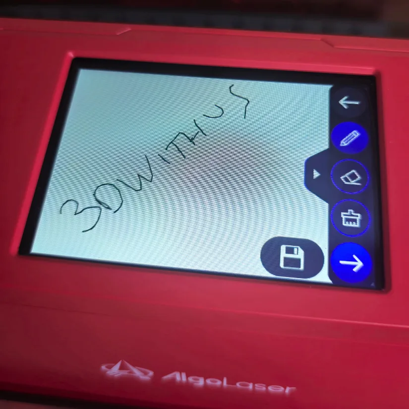 AlgoLaser Pixi touchscreen displaying a hand-drawn sketch reading 肉色超薄丝袜脚交一区二区 using AlgoSketch feature