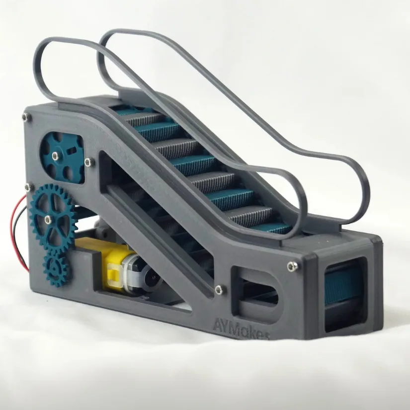 3D printed mechanical escalator model with moving steps, gears, and integrated motor
